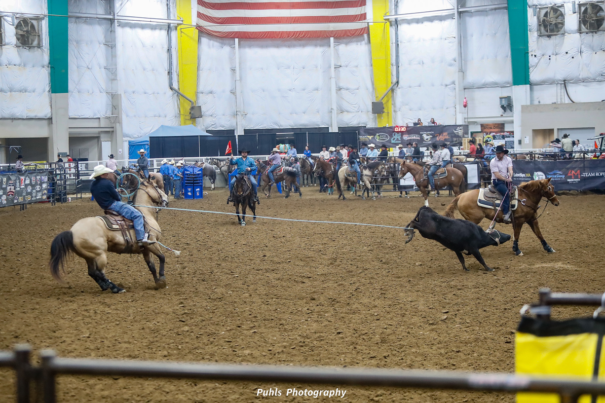 Coward To Cowboy member watching exclusive roping training video